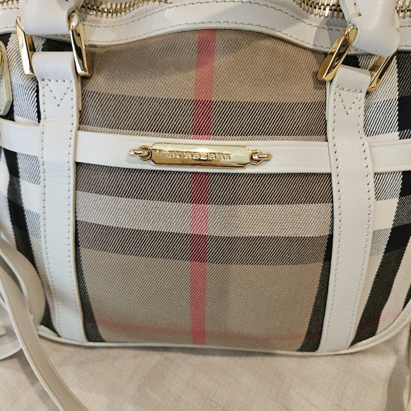 Burberry is a little over-sized crossbody with a top handle bag. Rarely used. - Picture 2 of 7